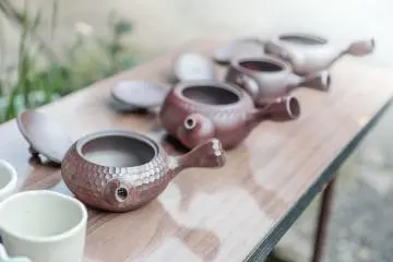 Tea pots drying outside