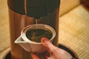 Adding water to the Kiyoka, Japanese green tea