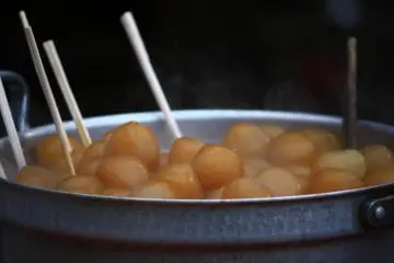 If you're feeling hungry, you can buy a stick of konnyaku balls, served with a dab of hot mustard.