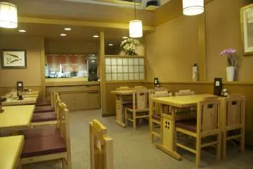 Clean, simple interior with table and chair seating
