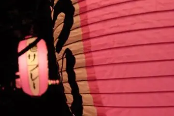 A close up of a lantern at night