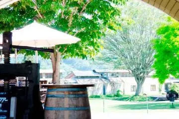 View through the archway of the Winery Garden and jam factory