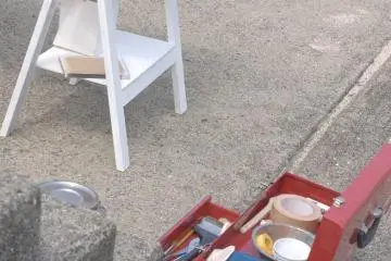 Painting supplies sit at the ready for use