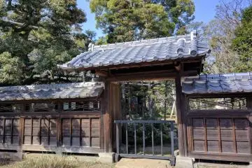 The gate admits visitors to the spacious garden