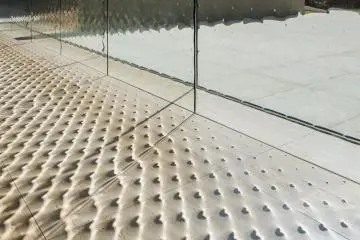 Approach to New Wing, with glass and effect designed by Hiroshi Sugimoto