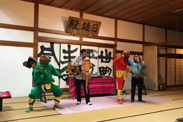 Oni at the concert at a local temple