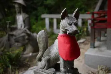 The "Inari" Jinja at the back features foxes and red tori gates