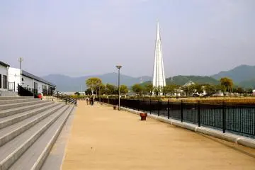 View of the tower from the waterfront eatery and shopping areas.