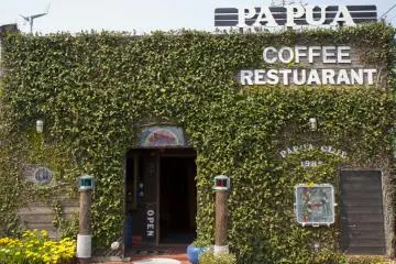 Ivy-covered Papua Club