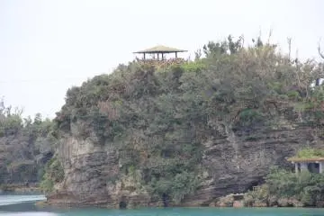 The observatory as seen from the bridge to nearyby Yakena Island; the main viewing area is on the upper left above the shoreline viewing area on the lower right