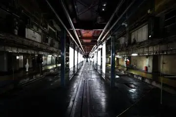 A former Kyoto Shimbun printing press converted into an exhibition space for Lauren Greenfield's 'Generation Wealth' exhibition