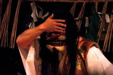 Although it's the same character as in dance one, he's wearing a different mask