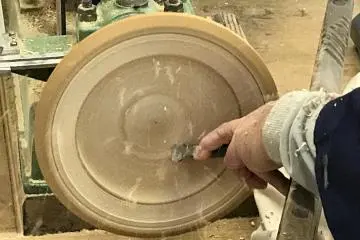 Beware of flying wood chips while the plate is being carved