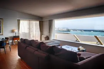 Spacious lounge with panoramic, ocean views