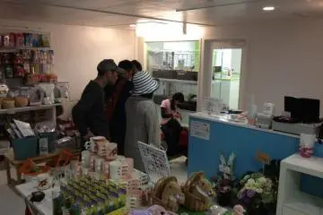 Customers line up to enter the rabbit petting room