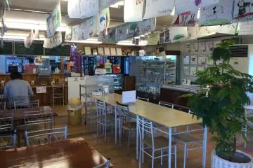 Dining space where pizza is freshly made. 