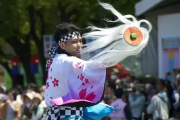 Hairy baton ornaments remind of costumery in Kagura performances