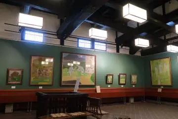An art exhibition that features a local painter. However, I was more interested in the huge beams and roof structure