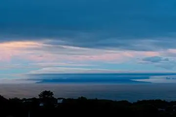Ooshima island under a hat of clouds.