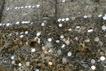 There are so many coins sticking out of the rocks. It should go without saying: please leave them in their place!