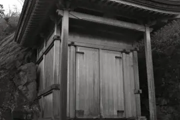 This small temple is built right up against a cave in the rock, and houses ornaments and statues for worship