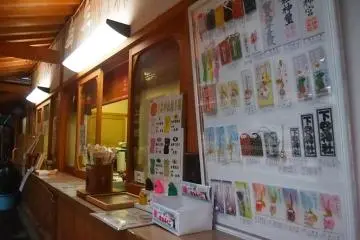 All kinds of charms being sold at the building on the right of the main building.