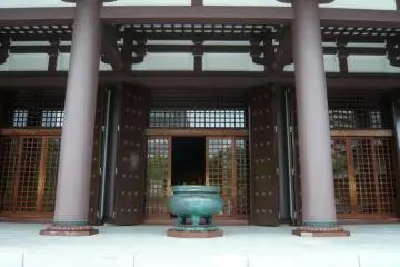 An incense burner stands in front of the entrance to Tocho-ji
