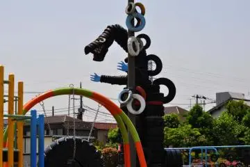 Godzilla reigning over the playground