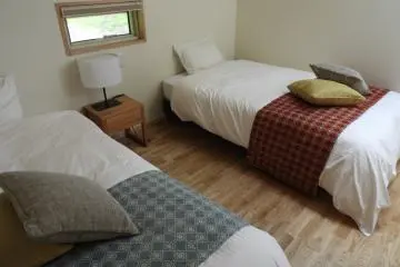 Cozy bedrooms in the Cottages
