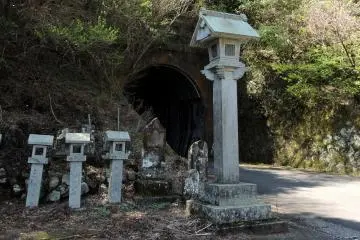 The path up to the cave begins near a tunnel