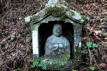 Small statue in its own shrine