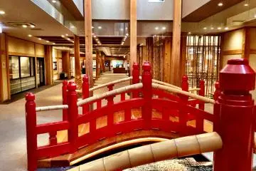 Bridges, stones and bamboo create a garden atmosphere