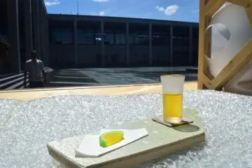 Tea and a Japanese sweet served in one of the artworks