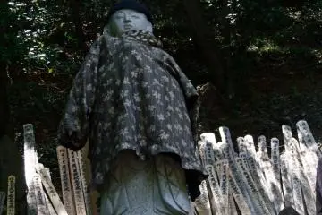 This stature looks down on the temple grounds from high up on a hill