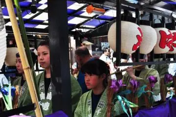 People playing traditional drums and flutes in the procession