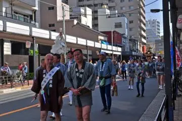 The procession leading down the street