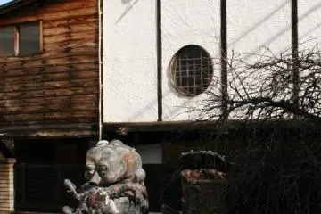 Classic local architecture, with inexplicable decorative hobgoblin