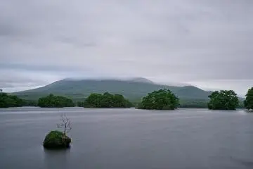 A view on the clouds moving fast over the summit of mount Komagatake