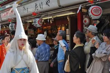 The white wigs and white hats give these ladies an ethereal appearance (Photo: Michelle Madden)