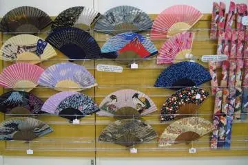 Here's another good item to get for your friends and relatives - a cool fan with a beautiful fan holder (seen on the right side).