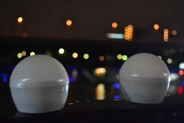 Two LED lights before being placed in the water.