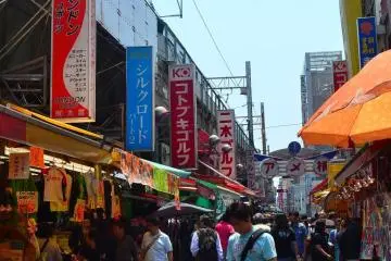 Stalls and shops lining the tiny alley.