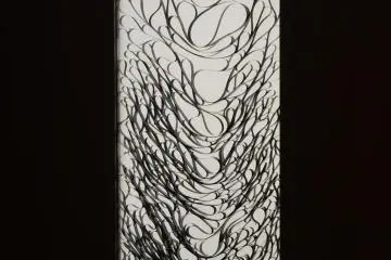 Chaotic sounds tape that descends from above.