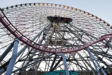 The ferris wheel towering over head