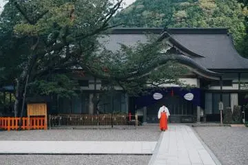 A shrine maiden performing her duties