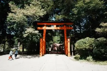 The red tori gates mark the entrance into the spiritual world