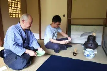Performing a tea ceremony with guests