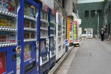 Once you see this row of vending machines, you'll know you're walking in the right direction. Follow the row of machines and walk a little further in. You'll see the sign for Incubar soon!