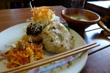 Veggie meat burger on genmai rice bun with soup