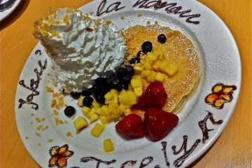 If it's your birthday, you are honored with a personalized plate of pancakes with fresh fruit, staff singing a birthday tune and a couple of lei's for a photo opportunity